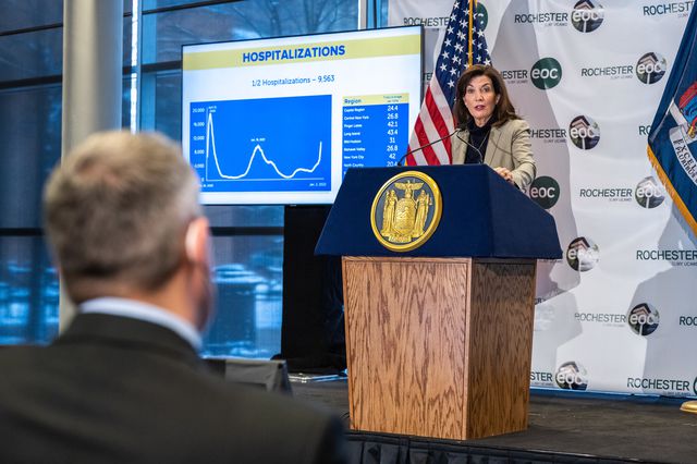 Gov. Kathy Hochul, at podium, holds a news briefing on the status of COVID-19 in New York state on January 3rd.